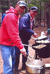 Men Grilling at Picnic